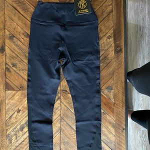 Black workout pants with mesh detail